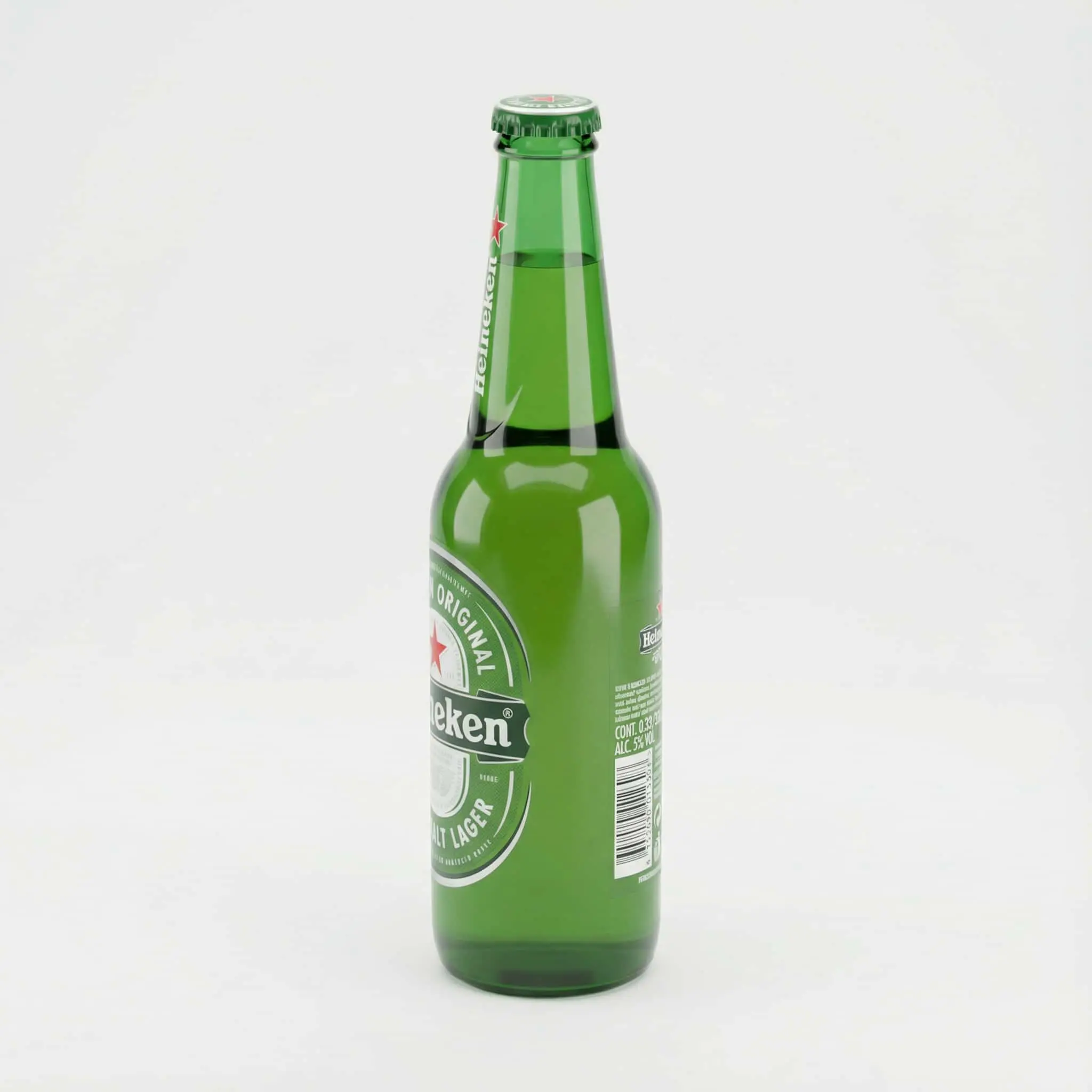 profil latéral bouteille bière blonde Heineken 33 cl verte